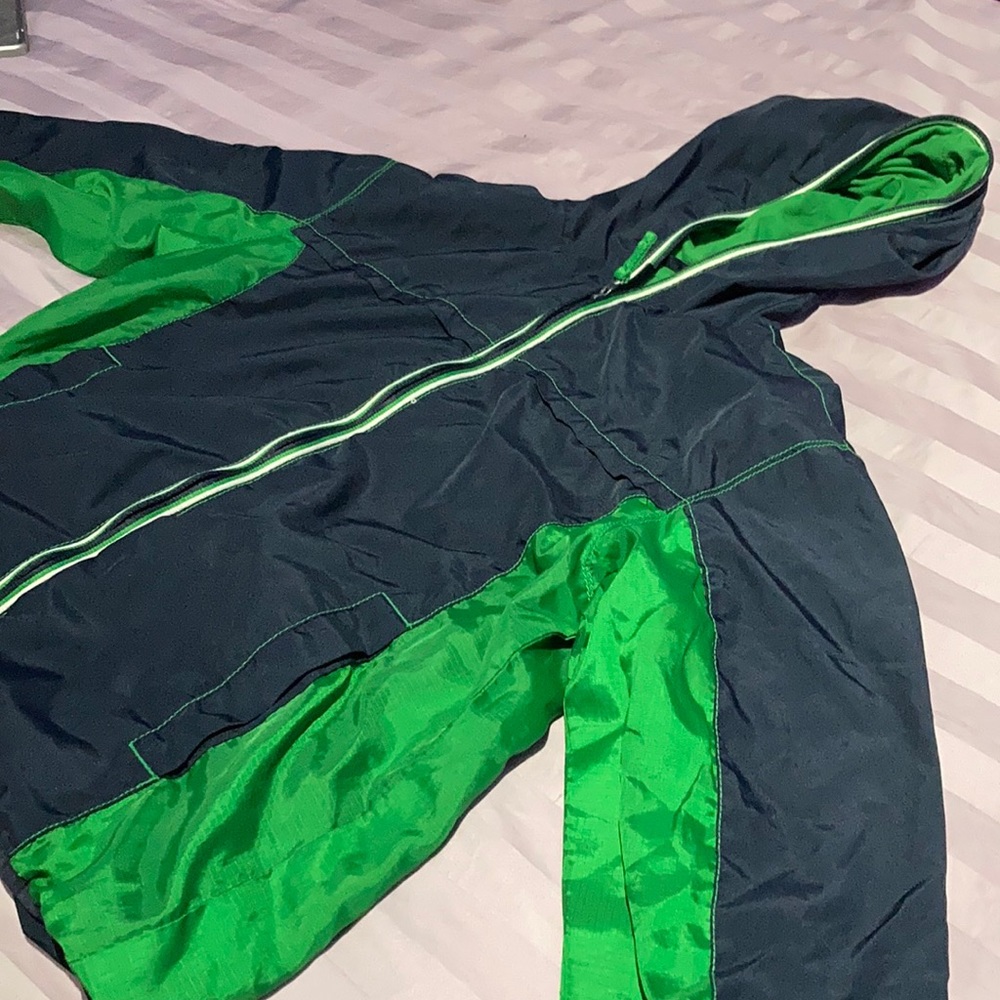 green windbreaker